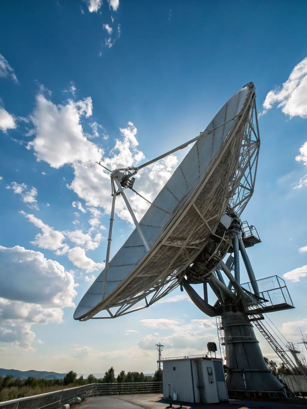 An image of Eleventen's satellite technology enabling remote communication in a rural area, highlighting the global connectivity solutions provided by the company.